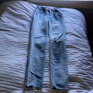 Light wash Garage skinny jeans.